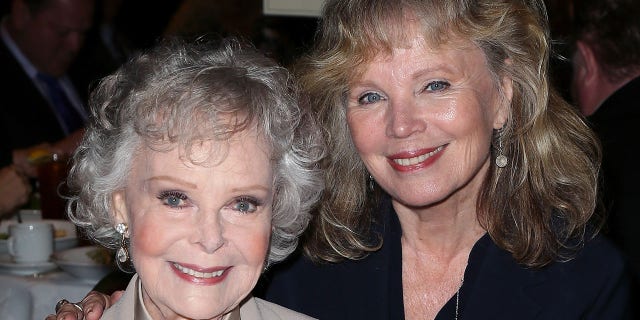 Actresses June Lockhart (L) and Marta Kristen attend the Hollywood Chamber of Commerce honoring June Lockhart with it's Lifetime Achievement Award at the Universal Hilton Hotel on March 26, 2015 in Universal City, California.