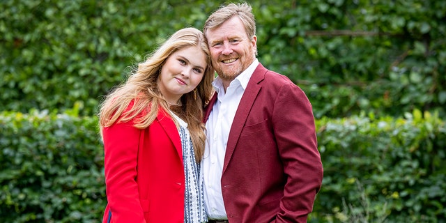 King Willem-Alexander and Princess Amalia of the Netherlands pose for the media at Huis ten Bosch Palace July 16, 2021, in The Hague, Netherlands. 