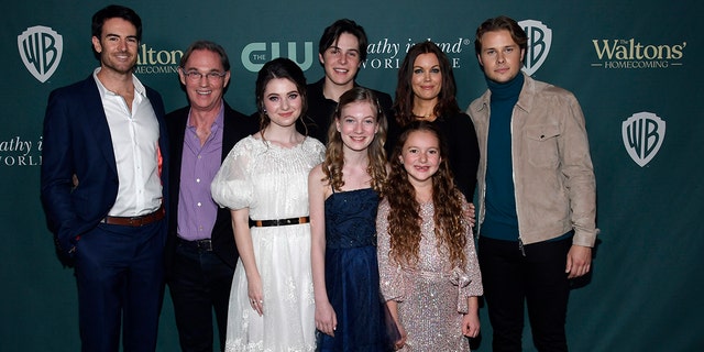 Cast members from left to right: Ben Lawson, Richard Thomas, Marcelle LeBlanc, Christian Finlayson, Tatum Matthews, Callaway Corrick, Bellamy Young and Logan Shroyer pose during the screening and reception celebrating ''The Waltons' Homecoming'' at The Garland on November 13, 2021 in North Hollywood, California. 
