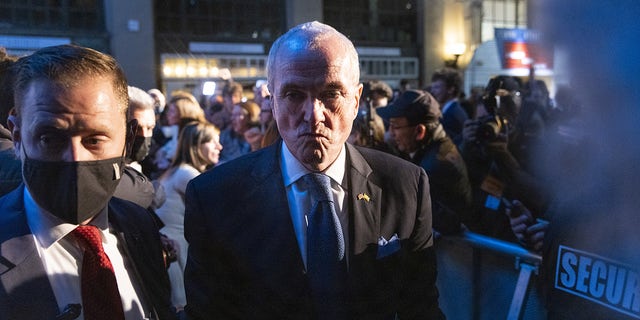 Phil Murphy, governor of New Jersey, exits after speaking during an election night event in Asbury Park, New Jersey, U.S., on Wednesday, Nov. 3, 2021. 