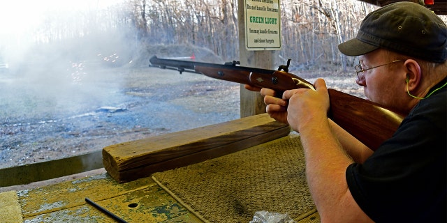 Gerry Lee practices his shooting skills at Clark Brothers' gun store and shooting range in Warrenton, Virginia, some 48 miles from Washington, D.C., on Jan. 16, 2020. 