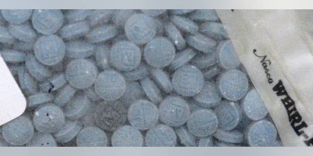 A fake heroin pill collected by the DEA.