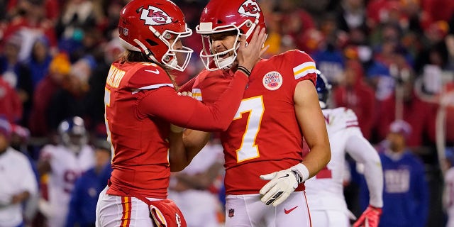 Kansas City Chiefs place kicker Harrison Butker (7) is congratulated by Tommy Townsend after making a 34-yard field goal late in the second half of an NFL football game against the New York Giants Monday, Nov. 1, 2021, in Kansas City, Mo. The Chiefs won 20-17.