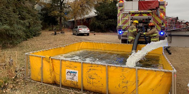 Personnel responding to a house fire in Boulder County. 