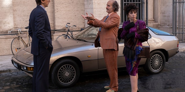 Left to right: Adam Driver as Maurizio Gucci, Jared Leto as Paolo Gucci and Lady Gaga as Patrizia Reggiani in 'House of Gucci.'