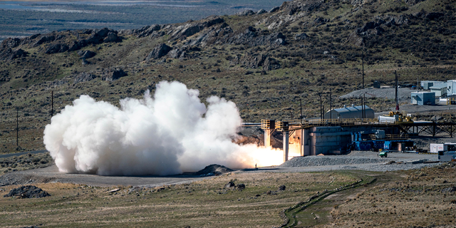 FILE: The US Navy, in collaboration with the US Army, conducts a static fire test of the first stage of the newly developed 34.5" common hypersonic missile that will be fielded by both services, in Promontory, Utah, U.S., in this handout image taken on October 28, 2021.