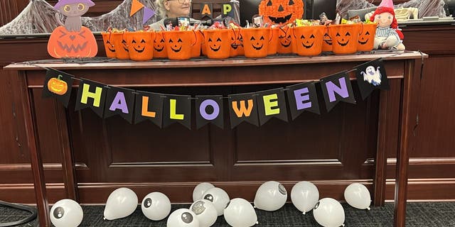 Officials at the Duval County Courthouse and Family Support Services of North Florida Inc. organized a Halloween-themed adoption ceremony in Jacksonville, Florida.