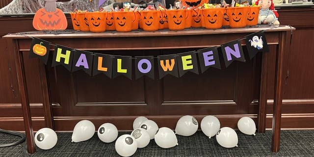 Officials at the Duval County Courthouse and Family Support Services of North Florida Inc. organized a Halloween-themed adoption ceremony in Jacksonville, Florida.