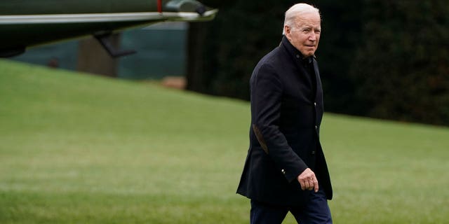 U.S. President Joe Biden walks from Marine One as he arrives from Wilmington, Delaware, at the White House in Washington, U.S., November 21, 2021.