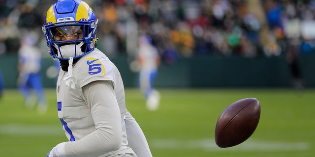 The Los Angeles Rams' Jalen Ramsey warms up before a game against the Green Bay Packers Nov. 28, 2021, in Green Bay, Wisc.