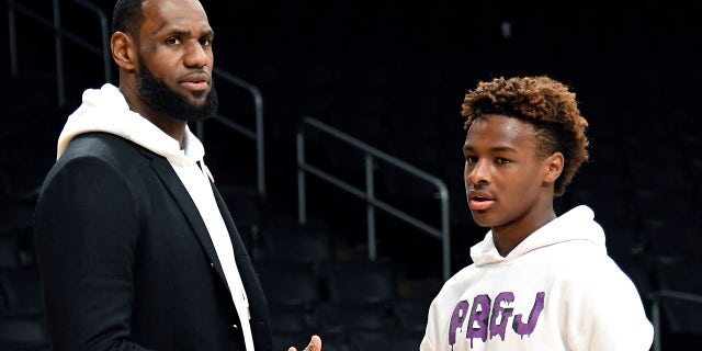 LOS ANGELES, CA - DECEMBER 28: LeBron James #23 of the Los Angeles Lakers and his son LeBron James Jr., on the court after the Los Angeles Clippers and Los Angeles Lakers basketball game at Staples Center on December 28, 2018 in Los Angeles, California.