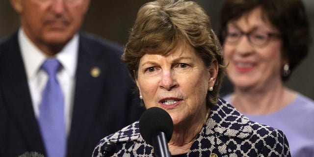 Sen. Jeanne Shaheen speaks as Sen. Joe Manchin and Sen. Susan Collins listen during a news conference after a procedural vote for the bipartisan infrastructure framework at Dirksen Senate Office Building July 28, 2021 on Capitol Hill in Washington, D.C.