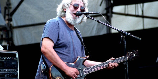 Jerry Garcia of the Grateful Dead performing in Seattle, Washington on May 26, 1995. Garcia's life will be chronicled in a biopic directed by Martin Scorsese.