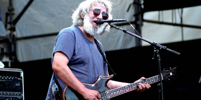 Jerry Garcia of the Grateful Dead performing in Seattle, Washington on May 26, 1995. Garcia's life will be chronicled in a biopic directed by Martin Scorsese.