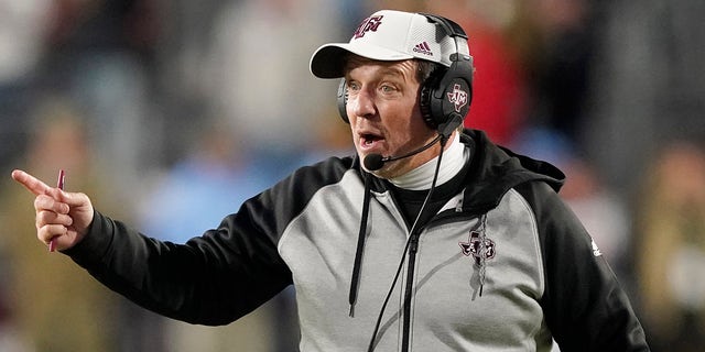 Texas A&amp;M coach Jimbo Fisher reacts to an official's call during the second half of the team's NCAA college football game against Mississippi, Saturday, Nov. 13, 2021, in Oxford, Miss.