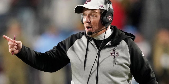 Texas A&M coach Jimbo Fisher reacts to an official's call during the second half of the team's NCAA college football game against Mississippi, Saturday, Nov. 13, 2021, in Oxford, Miss.