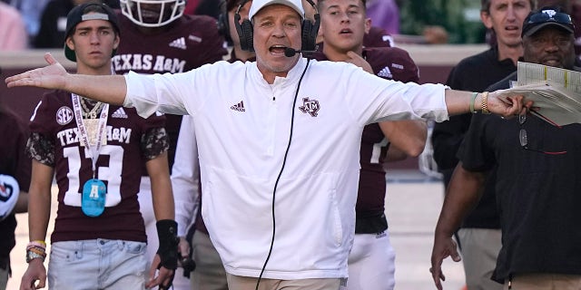 Texas A&M coach Jimbo Fisher yells to the officials during the first half of an NCAA college football game against Auburn Saturday, Nov. 6, 2021, in College Station, Texas.