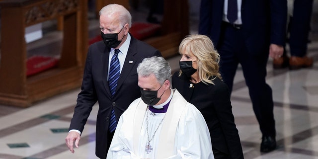 President Joe Biden and first lady Jill Biden arrive for a funeral service for former Secretary of State Colin Powell at the Washington National Cathedral, Friday, Nov. 5, 2021, in Washington. (AP Photo/Evan Vucci)