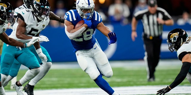 Indianapolis Colts running back Jonathan Taylor (28) runs against the Jacksonville Jaguars in the first half of an NFL football game in Indianapolis, Sunday, Nov. 14, 2021.