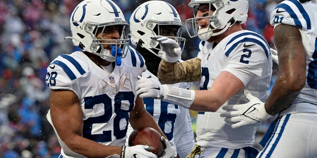 Colts Top Cardinals As Indianapolis Wins Sixth Of Last Seven Games - Fox News 2 Indianapolis Colts running back Jonathan Taylor (28) celebrates with Carson Wentz (2) after scoring during an NFL football game against the Buffalo Bills in Orchard Park, N.Y., earlier this season.
