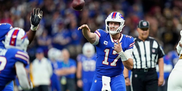 Buffalo Bills quarterback Josh Allen (17) passes in the first half of a game against the New Orleans Saints in New Orleans, Thursday, Nov. 25, 2021.