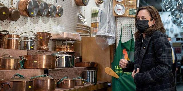 U.S. Vice President Kamala Harris laughs while shopping for pots at E. Dehillerin Cookware Shop in Paris, France November 13, 2021. Sarahbeth Maney/Pool via REUTERS TPX IMAGES OF THE DAY