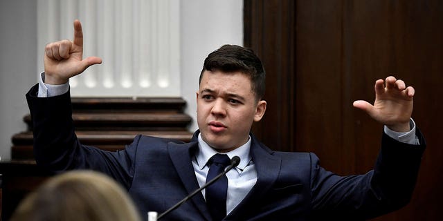 Kyle Rittenhouse talks about how Gaige Grosskreutz was holding his gun when Rittenhouse shot him on Aug. 25, 2020, while testifying during his trial at the Kenosha County Courthouse in Kenosha, Wisconsin, November 10, 2021. Sean Krajacic/Pool via REUTERS TPX IMAGES OF THE DAY