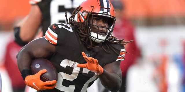 FILE - Cleveland Browns running back Kareem Hunt runs with the ball during an NFL football game against the Arizona Cardinals, Sunday, Oct. 17, 2021, in Cleveland.