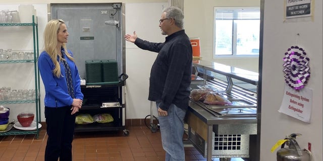 Republican Senate candidate Kelly Tshibaka tours Fairbanks Rescue Mission with CEO Pete Kelly in Fairbanks, Alaska, in October 2021.