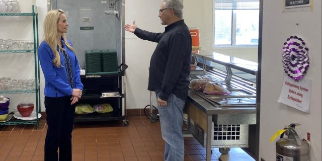 Republican Senate candidate Kelly Tshibaka tours Fairbanks Rescue Mission with CEO Pete Kelly in Fairbanks, Alaska, in October 2021.