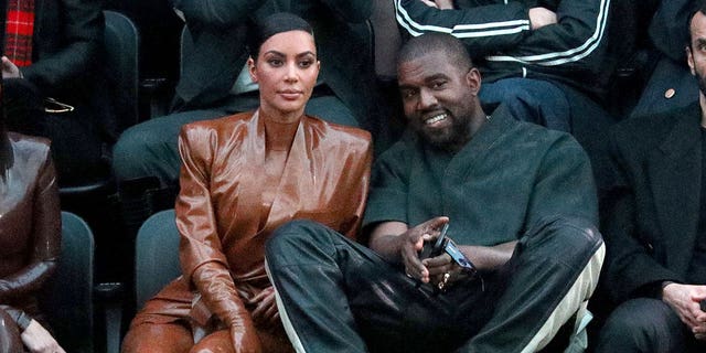 Kanye West said God would bring him and estranged wife Kim Kardashian back together and inspire millions of families during a visit to Skid Row on Thanksgiving.