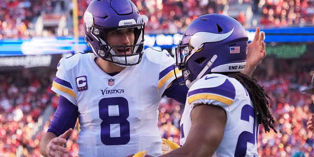Nov 28, 2021; Santa Clara, California, USA; Minnesota Vikings quarterback Kirk Cousins (8) celebrates with running back Alexander Mattison (25) after a touchdown during the third quarter at Levi's Stadium.