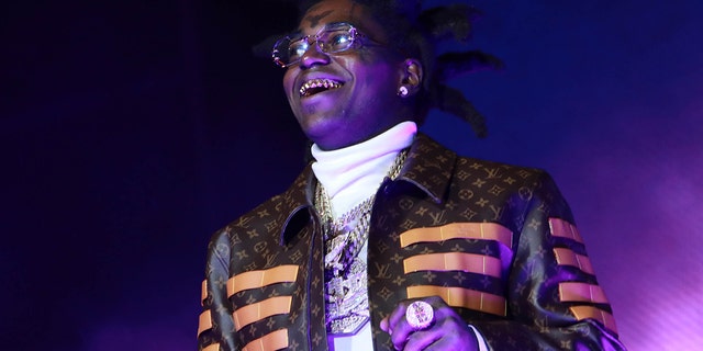 Kodak Black handed out over 5,000 turkeys to families in need despite currently being in rehab.