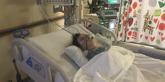 Kyla Luzader in a hospital bed Feb. 9, 2020.