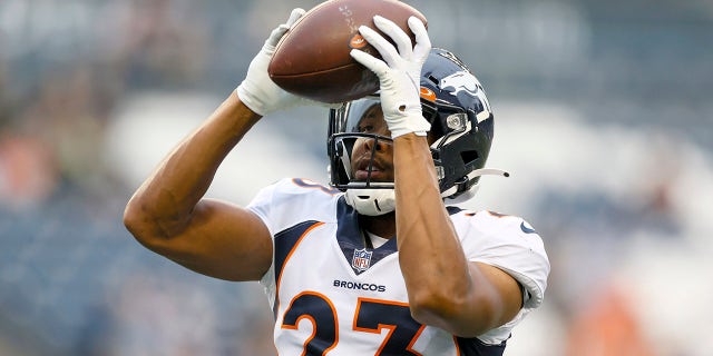 SEATTLE, WASHINGTON - AUGUST 21: Cornerback Kyle Fuller #23 of the Denver Broncos warms up before an NFL preseason game against the Seattle Seahawks at Lumen Field on August 21, 2021 in Seattle, Washington. The Denver Broncos beat the Seattle Seahawks 30-3.