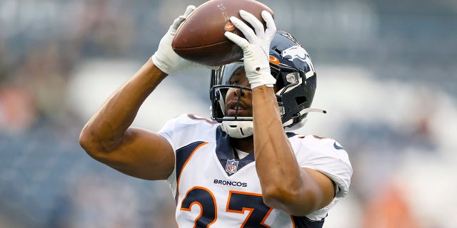 SEATTLE, WASHINGTON - AUGUST 21: Denver Broncos cornerback Kyle Fuller # 23 warms up before an NFL preseason game against the Seattle Seahawks at Lumen Field on August 21, 2021 in Seattle, Washington.  The Denver Broncos beat the Seattle Seahawks 30-3. 