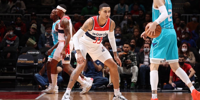 WASHINGTON, DC -¬ NOVEMBER 22: Kyle Kuzma #33 of the Washington Wizards plays defense during the game against the Charlotte Hornets on November 22, 2021 at Capital One Arena in Washington.