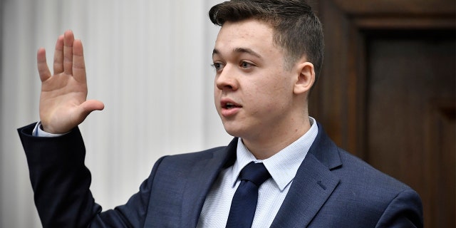 Kyle Rittenhouse is sworn in before testifying in his trial at Kenosha County Courthouse in Kenosha, Wisconsin, on Nov. 10, 2021.