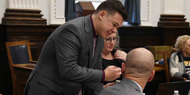 Kyle Rittenhouse and defense attorney Corey Chirafisi after a break during the Kyle Rittenhouse trial at the Kenosha County Courthouse on November 9, 2021 in Kenosha, Wisconsin. Rittenhouse is accused of shooting three demonstrators, killing two of them, during a night of unrest that erupted in Kenosha after a police officer shot Jacob Blake seven times in the back while being arrested in August 2020. Rittenhouse, from Antioch, Illinois, was 17 at the time of the shooting and armed with an assault rifle. He faces counts of felony homicide and felony attempted homicide.