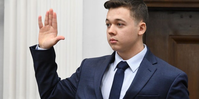 Kyle Rittenhouse is sworn in to testify during his trial at the Kenosha County Courthouse on Wednesday in Kenosha, Wisconsin.