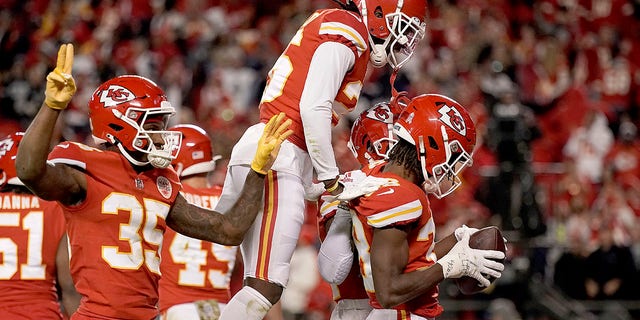 Kansas City Chiefs cornerback L'Jarius Sneed, right, celebrates with teammates after catching an interception late in the second half of an NFL football game against the Dallas Cowboys on Sunday, November 21, 2021 in Kansas City, Mo.  Chiefs won 19-9.