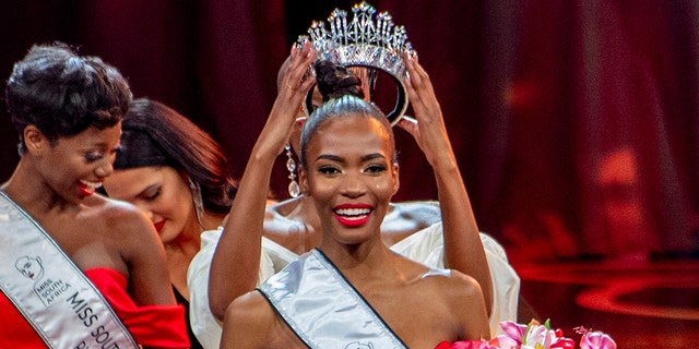 Lalela Mswane is crowned Miss South Africa in Cape Town, Saturday, Oct. 16, 2021. Controversy is swirling around the Miss South Africa beauty pageant, as the government has withdrawn its support from the event because of its affiliation with the Miss Universe contest, which is to be held in Israel in December. 