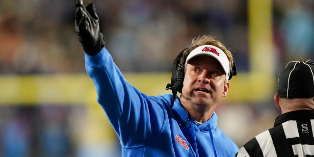 Mississippi head coach Lane Kiffin argues a call, that is shown on the stadium monitor, with a field official during the second half of an NCAA college football game against Texas A&M, Saturday, Nov. 13, 2021, in Oxford, Miss. Mississippi won 29-19.