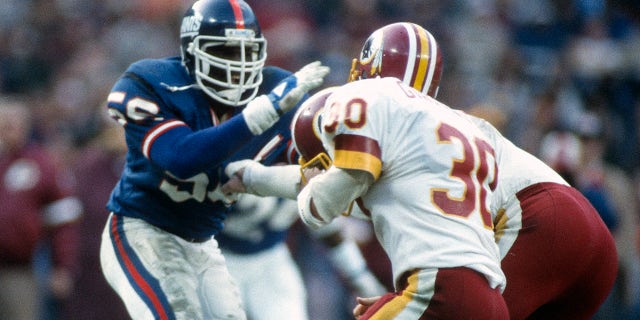 Lawrence Taylor in action against Washington during an NFL football game Dec. 19, 1982 at RFK Stadium in Washington, D.C. 