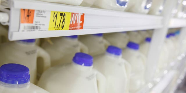 Gallons of milk in the dairy products section can be seen on Display at a new Wal-Mart store in Chicago, January 24, 2012. The store will open on January 25, and it will be Wal-Mart's largest outlet in Chicago.