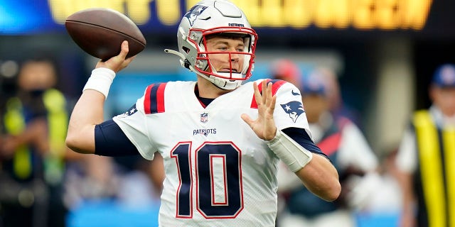 New England Patriots quarterback Mac Jones throws during the first half of an NFL football game against the Los Angeles Chargers Sunday, Oct. 31, 2021, in Inglewood, Calif.