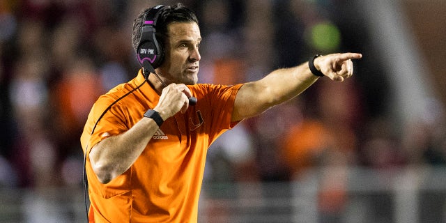 Miami head coach Manny Diaz directs his team against Florida State in Tallahassee, Florida, on Saturday, Nov. 13, 2021.