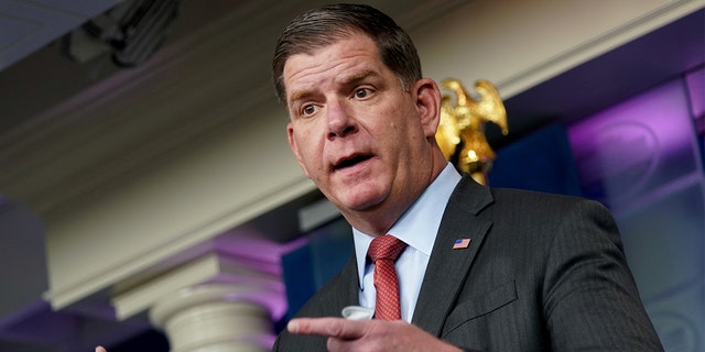 FILE: Secretary of Labor Marty Walsh speaks during a news conference at the White House in Washington, April 2, 2021. REUTERS/Erin Scott/File Photo