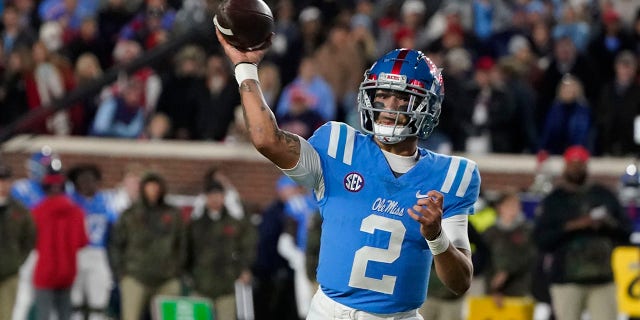 Mississippi quarterback Matt Corral throws a pass against Texas A&M during the first half of an NCAA college football game, Saturday, Nov. 13, 2021, in Oxford, Miss.