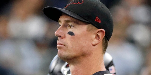 Atlanta Falcons quarterback Matt Ryan watches play against the Dallas Cowboys late in the second half of an NFL football game in Arlington, Texas, Sunday, Nov. 14, 2021.